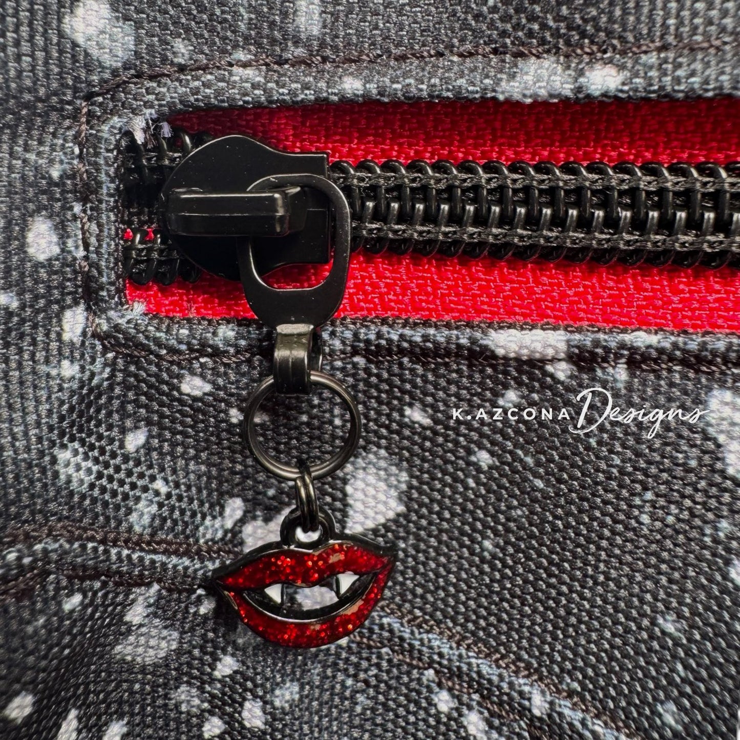 Fangs Zipper Pull