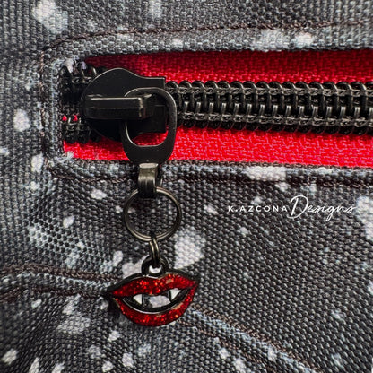 Fangs Zipper Pull